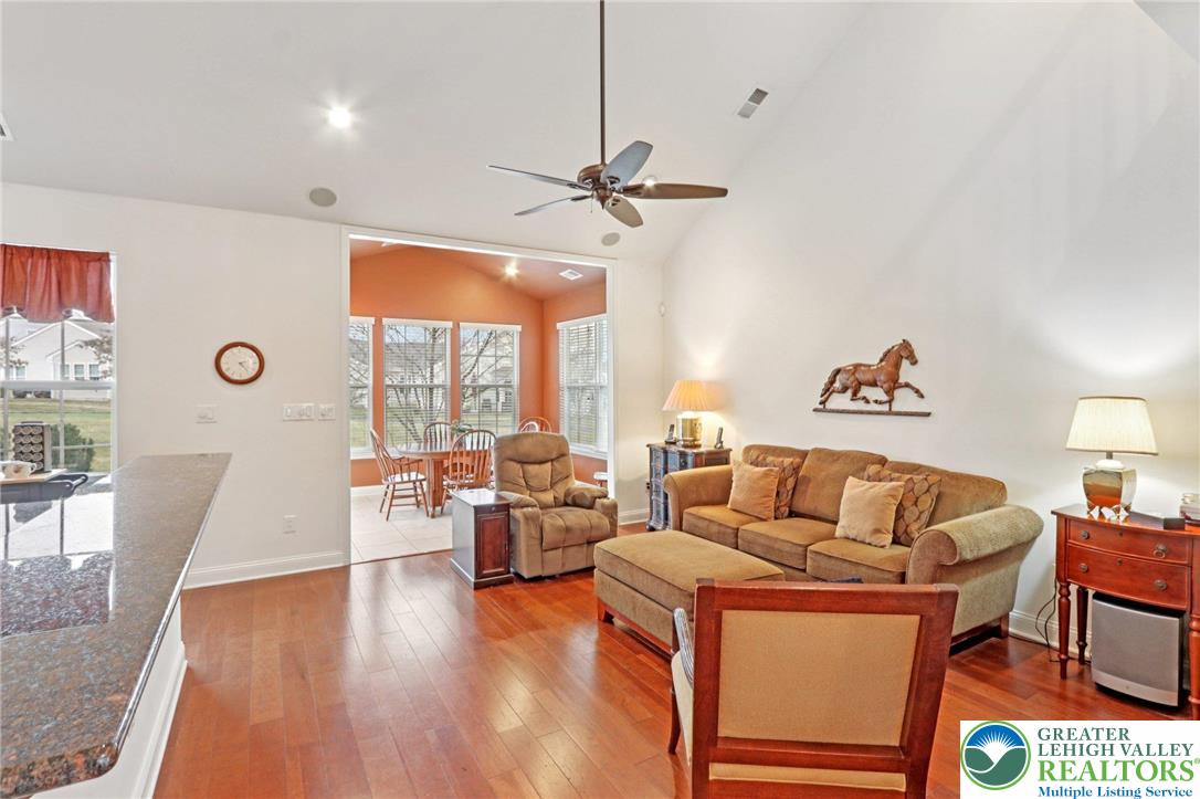 2076 Kingsview Road Lower Macungie Township, PA 18062 - Photo 11 of 53 a living room with furniture and a large window