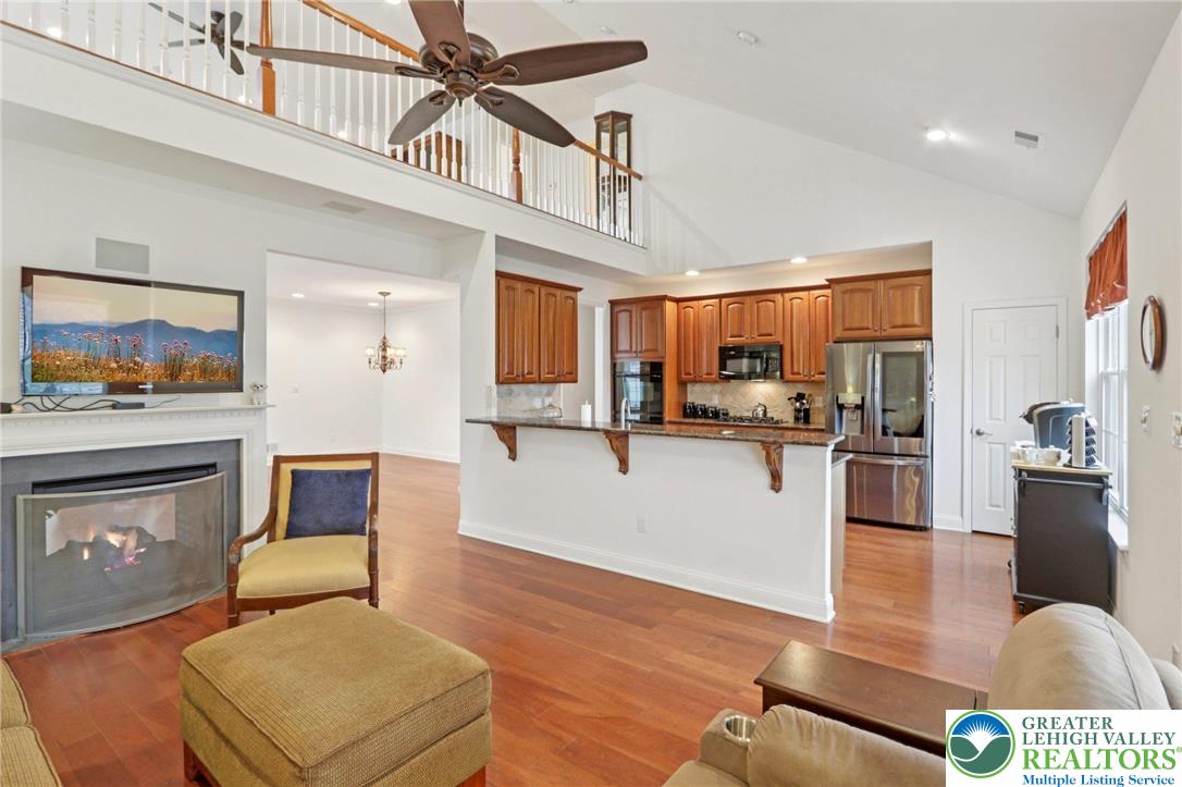 2076 Kingsview Road Lower Macungie Township, PA 18062 - Photo 13 of 53 a living room with furniture and a fireplace