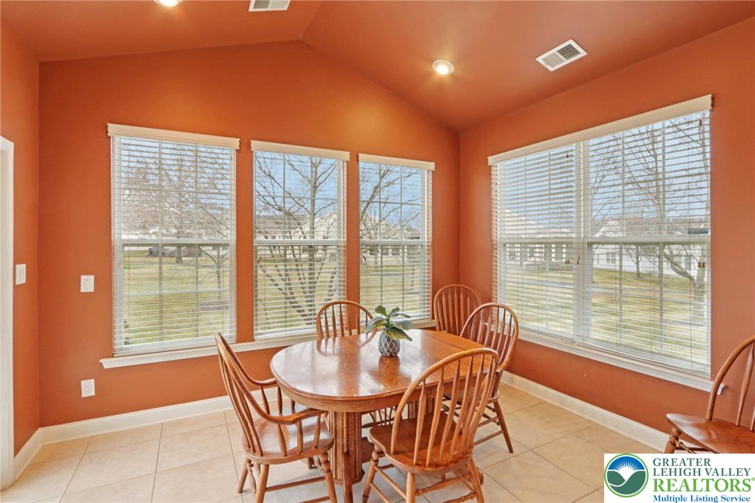 2076 Kingsview Road Lower Macungie Township, PA 18062 - Photo 15 of 53 a dining room with furniture and windows