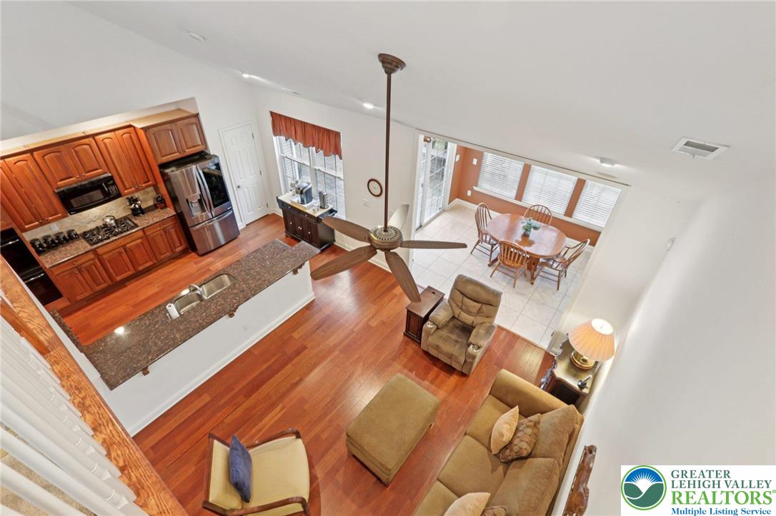 2076 Kingsview Road Lower Macungie Township, PA 18062 - Photo 17 of 53 a view of living room with furniture and floor to ceiling window
