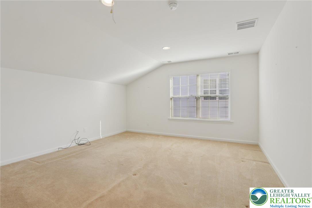 2076 Kingsview Road Lower Macungie Township, PA 18062 - Photo 37 of 53 a view of an empty room with a window