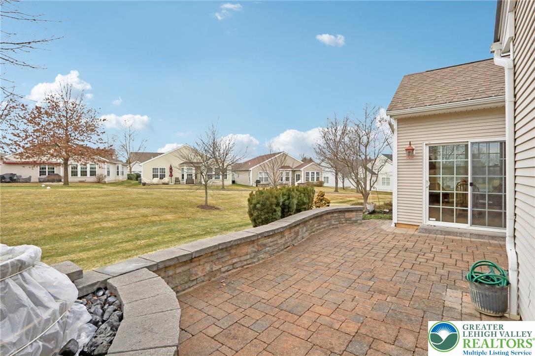 2076 Kingsview Road Lower Macungie Township, PA 18062 - Photo 43 of 53 a swimming pool with outdoor seating and yard
