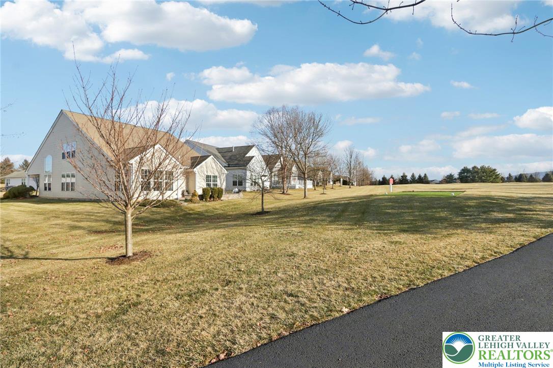 2076 Kingsview Road Lower Macungie Township, PA 18062 - Photo 44 of 53 a view of a street with houses