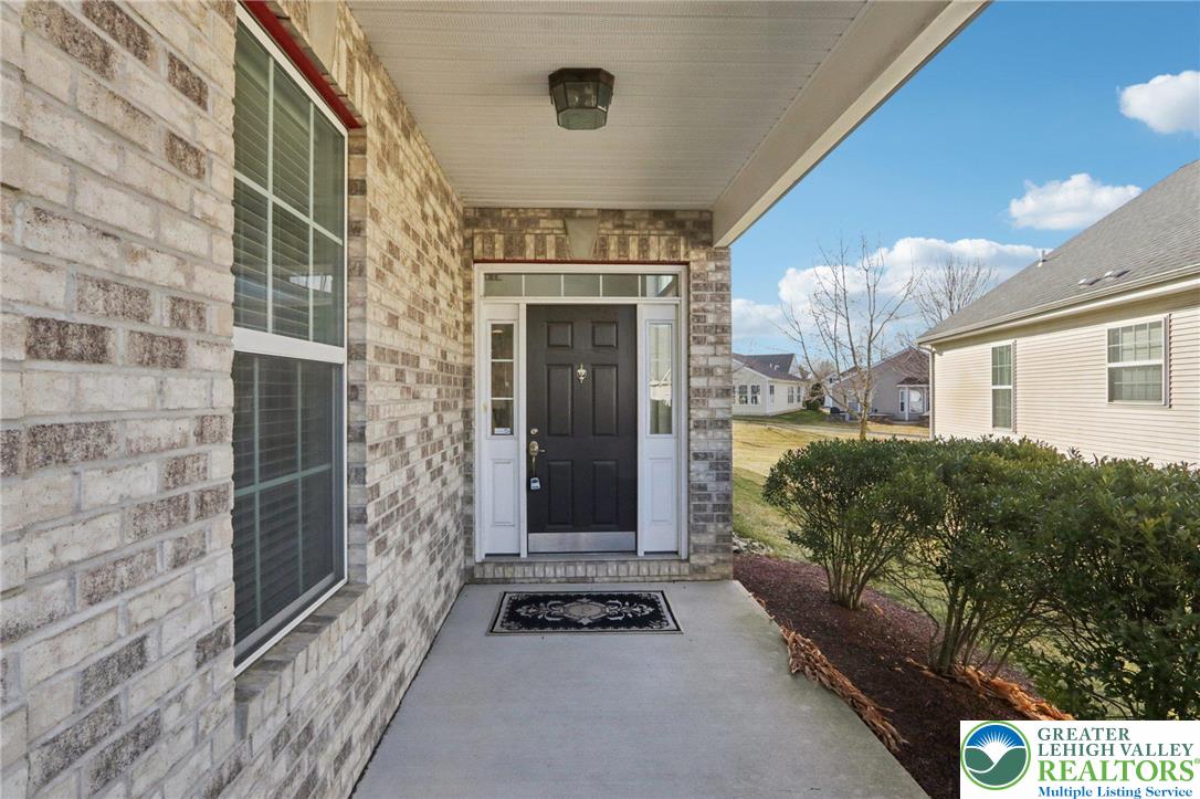 2076 Kingsview Road Lower Macungie Township, PA 18062 - Photo 49 of 53 a front view of a house with a yard