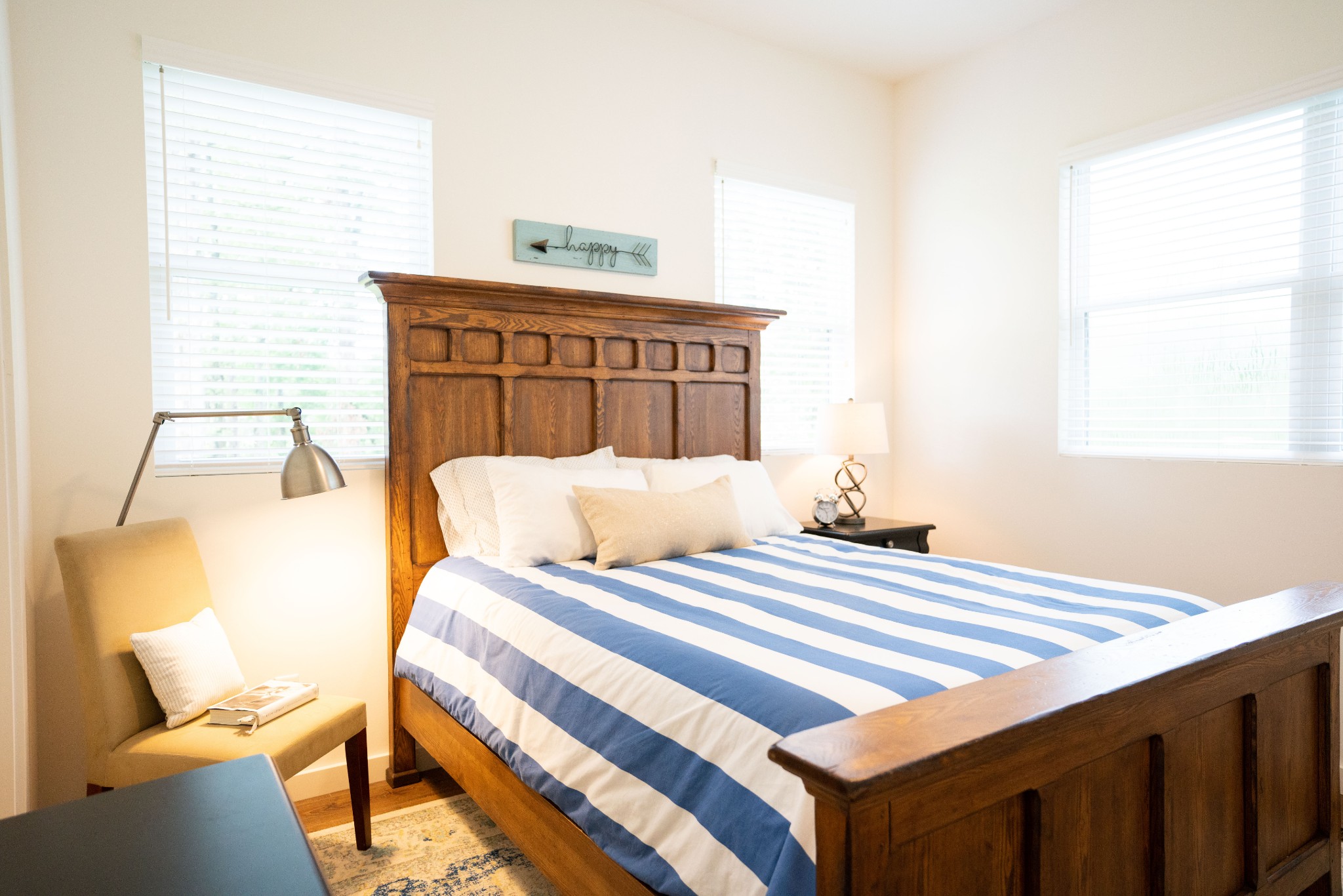 421 Eastside Road Burns, TN 37029 - Photo 28 of 39 a bedroom with a bed and wooden floor