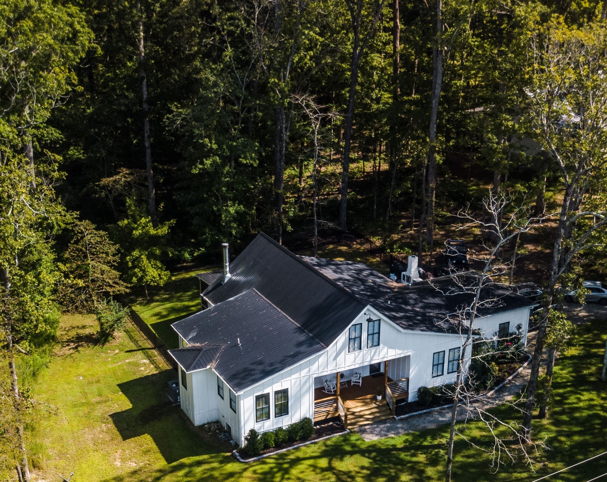 421 Eastside Road Burns, TN 37029 - Photo 39 of 39 a aerial view of a house with swimming pool and large trees