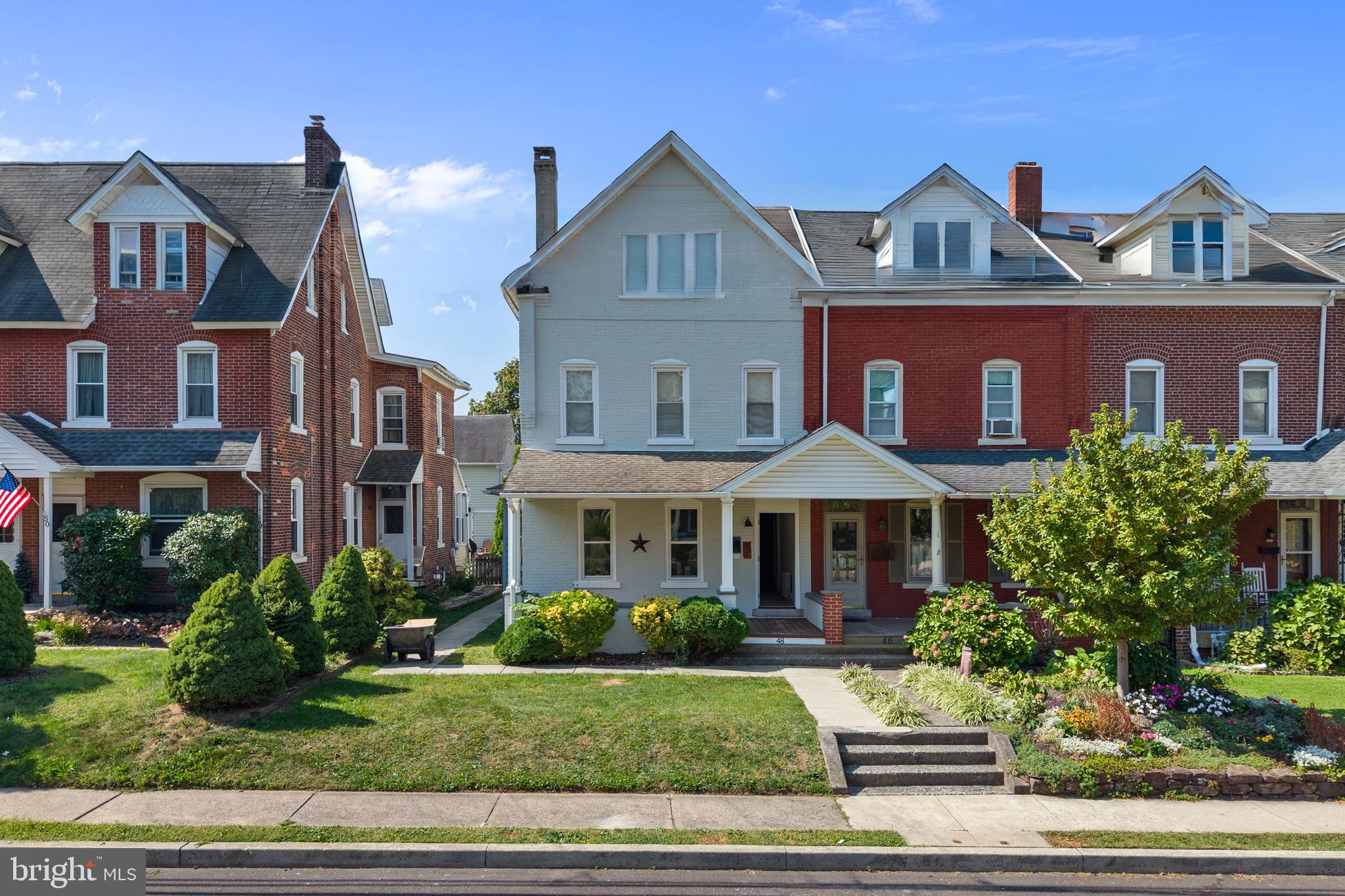 48 Penn Avenue, Unit B UPSTAIRS Souderton, PA 18964 - Photo 1 of 16 a front view of a house with a yard