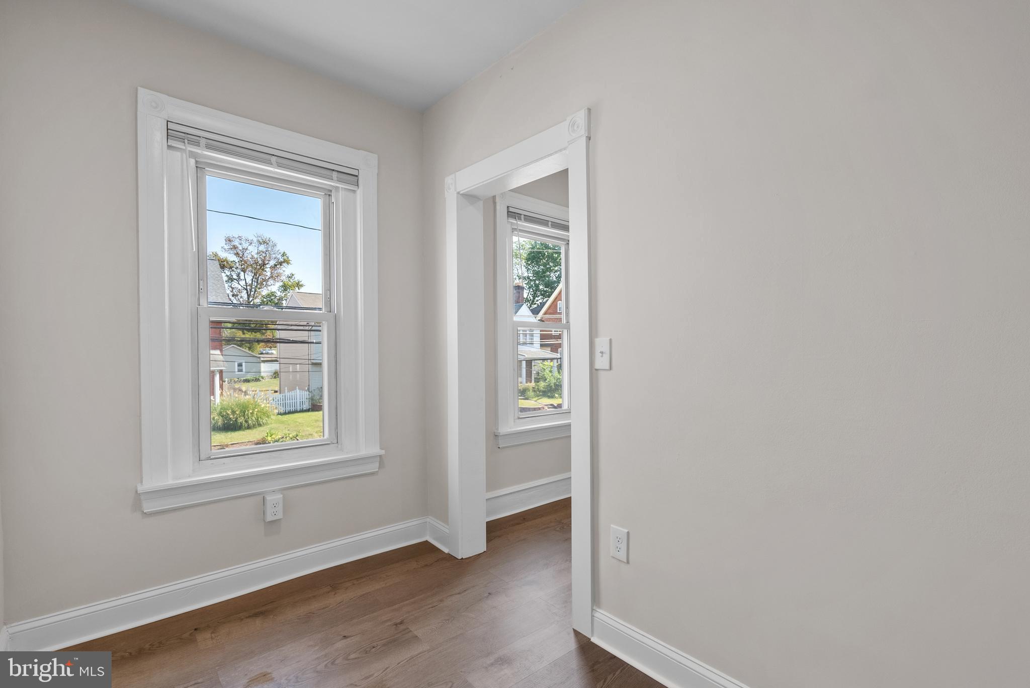 48 Penn Avenue, Unit B UPSTAIRS Souderton, PA 18964 - Photo 8 of 16 wooden floor in an empty room with a window