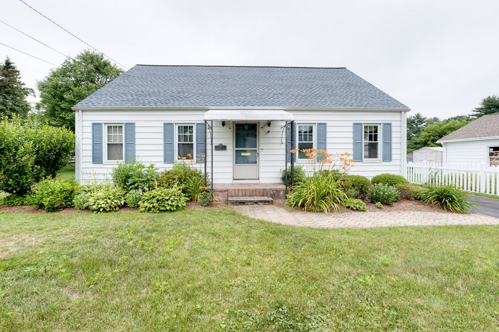 28 Cedar Street Three Rivers, MA 01080 - Photo 1 of 41 a front view of a house with a yard