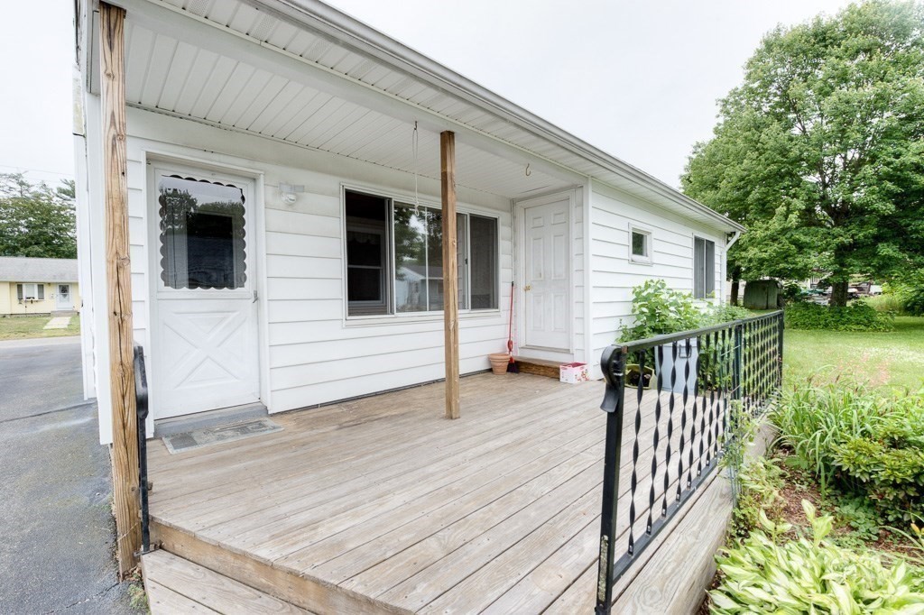 28 Cedar Street Three Rivers, MA 01080 - Photo 33 of 41 a view of a house with backyard and deck