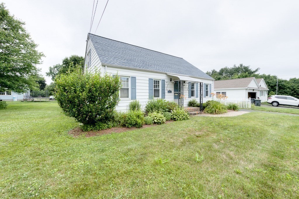28 Cedar Street Three Rivers, MA 01080 - Photo 38 of 41 a house view with a garden space
