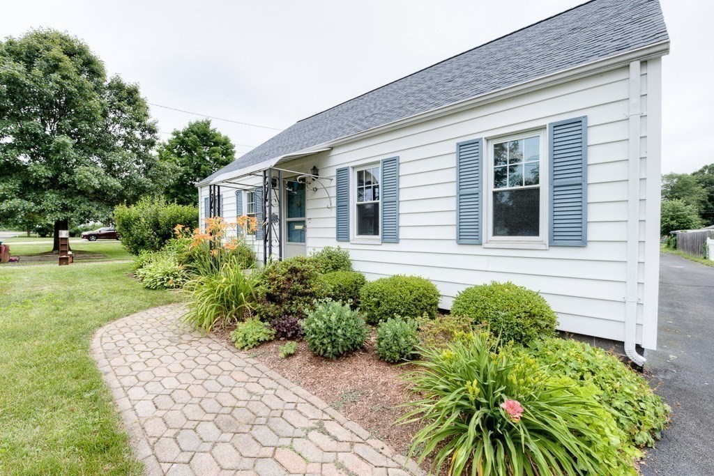 28 Cedar Street Three Rivers, MA 01080 - Photo 39 of 41 a front view of a house with a yard