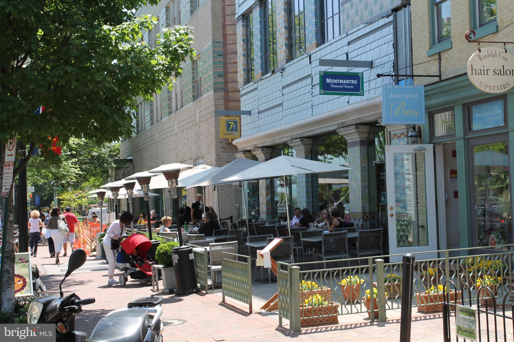 1302 East Capitol Street Northeast, Unit B Washington, DC 20003 - Photo 19 of 23 a view of people sitting in front of retail shop