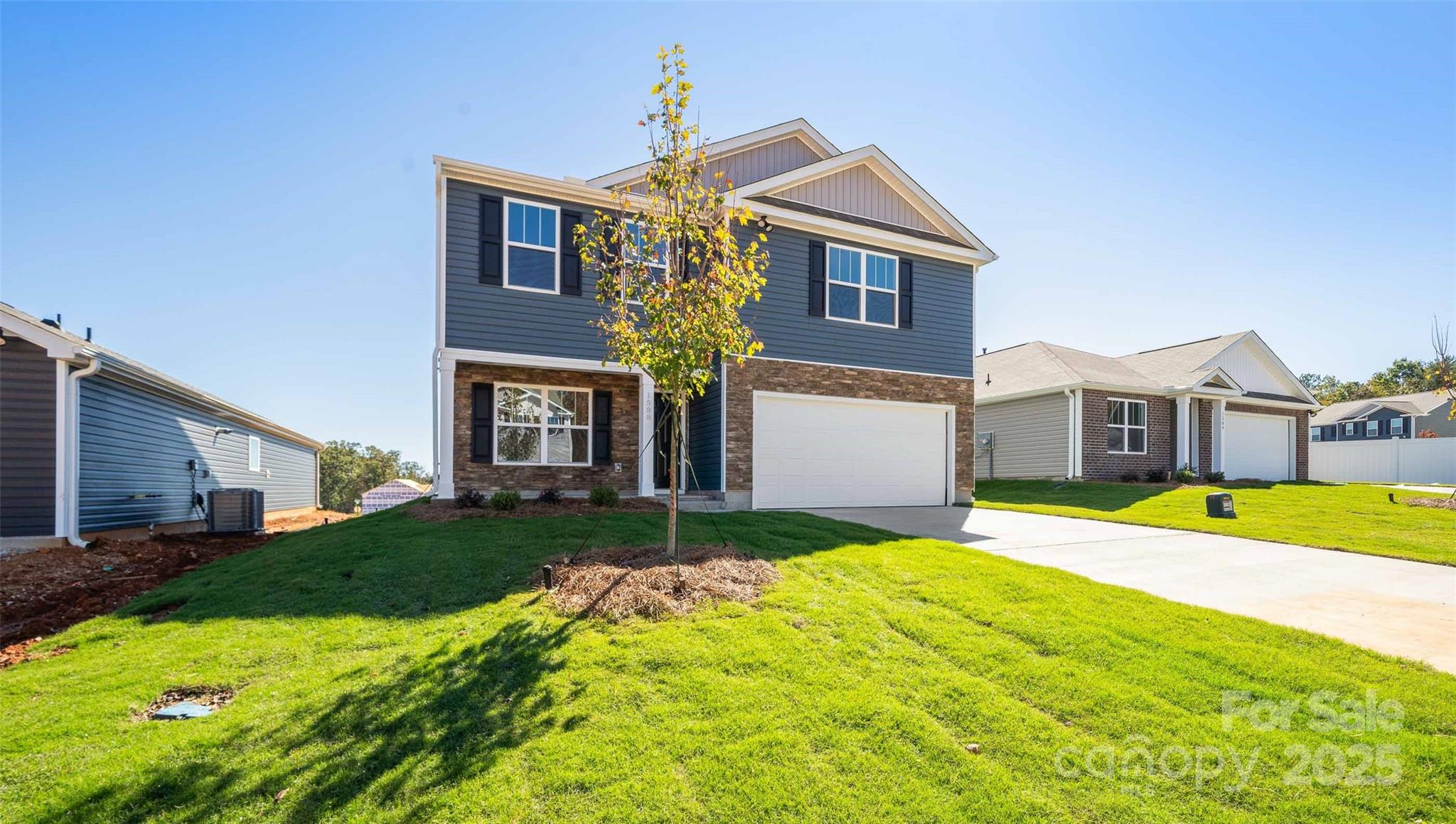 143 Callie River Clyde, NC 28721 - Photo 1 of 20 a front view of a house with a yard