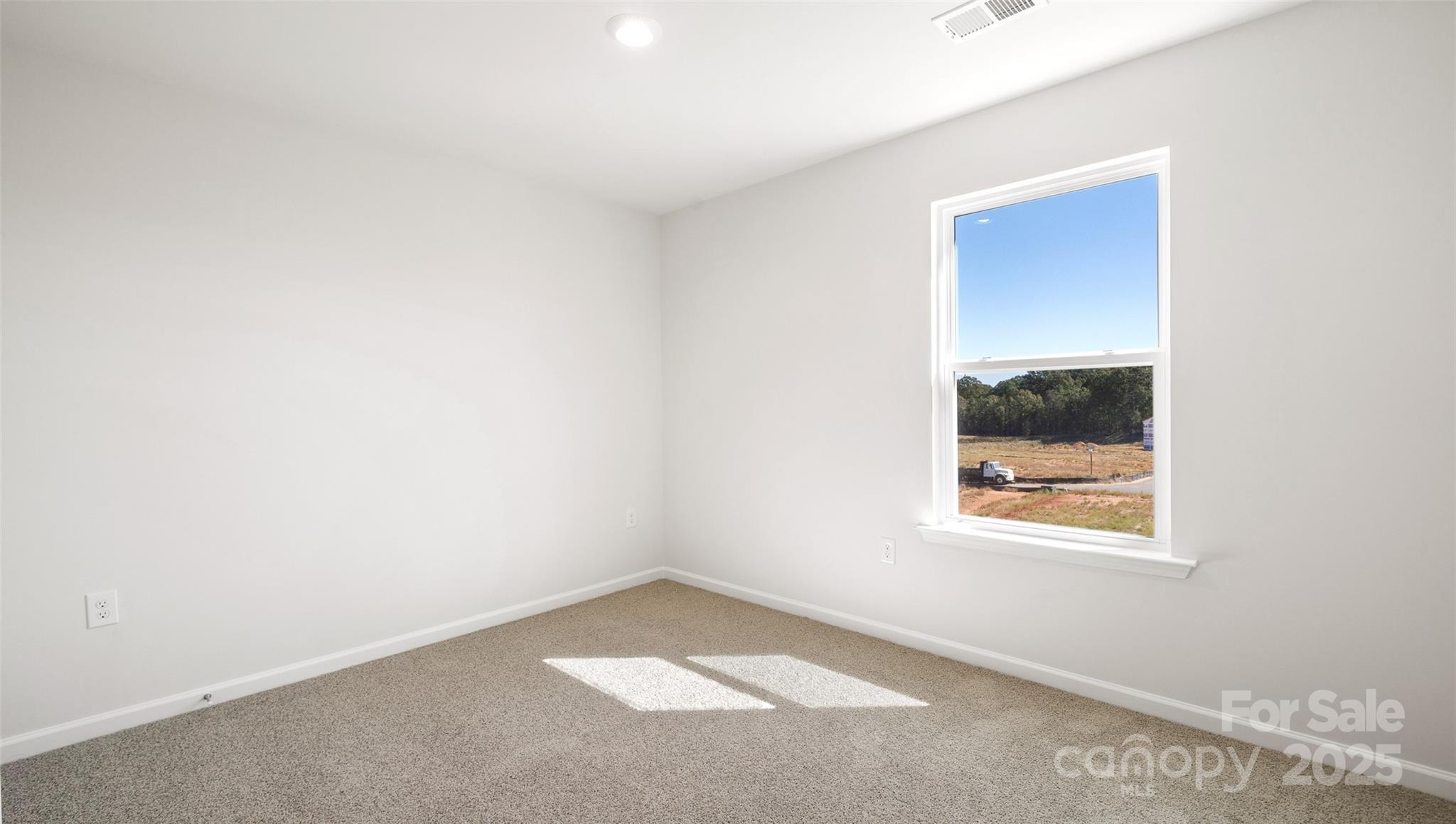 143 Callie River Clyde, NC 28721 - Photo 19 of 20 an empty room with a window