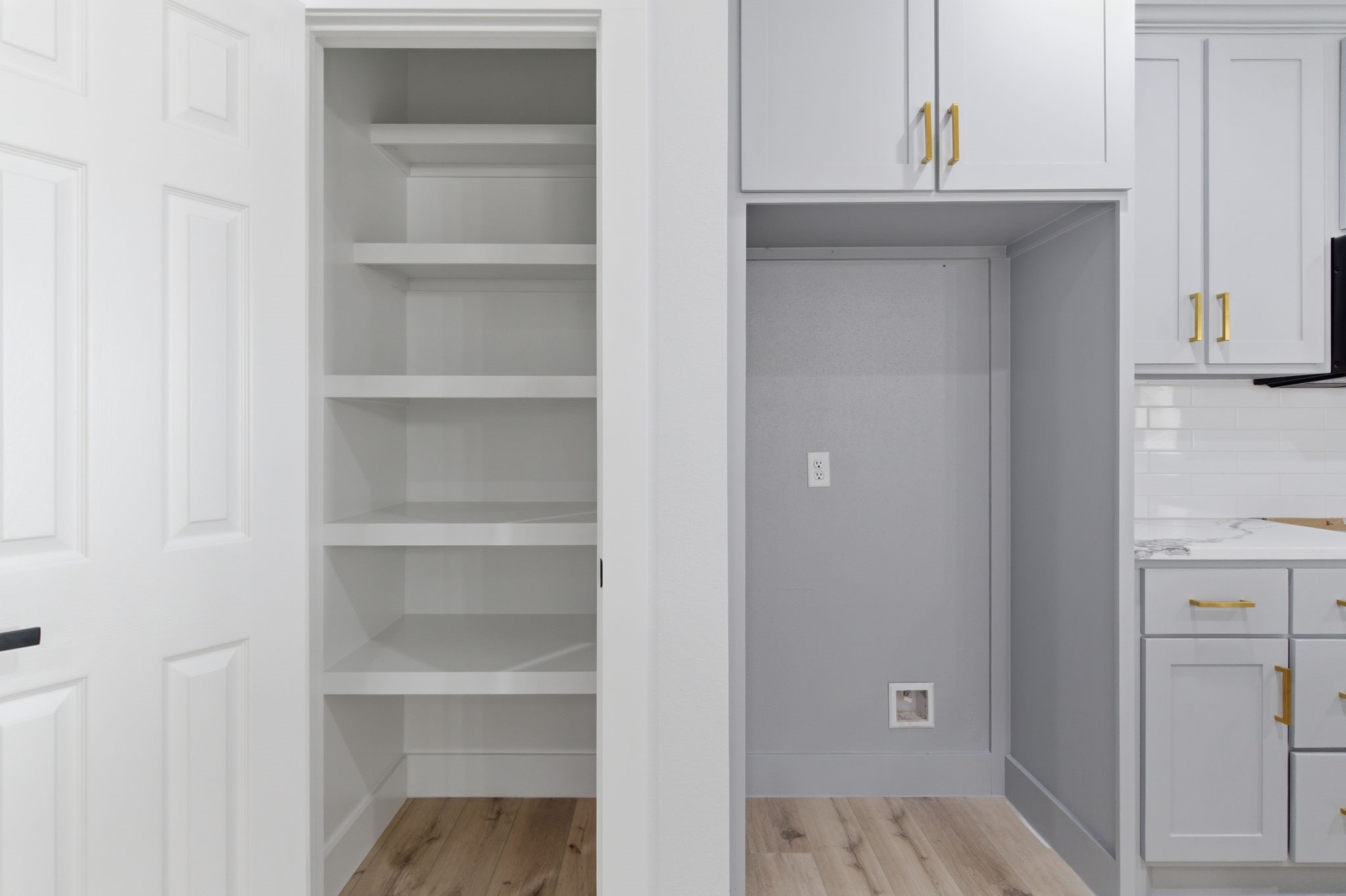 7040 Kinney Street Houston, TX 77087 - Photo 28 of 47 a view of walk in closet with empty racks
