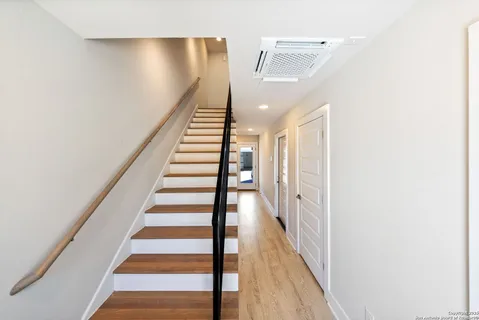 a view of entryway with wooden floor