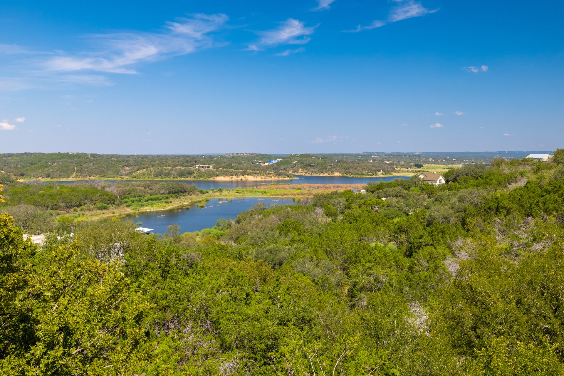 313 Kendall Road Spicewood, TX 78669 - Photo 29 of 34 Water view featuring a forest