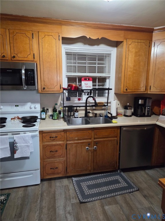 5813 Fitzhugh Avenue Richmond, VA 23226 - Photo 4 of 20 a kitchen with stainless steel appliances granite countertop a stove a sink and a microwave