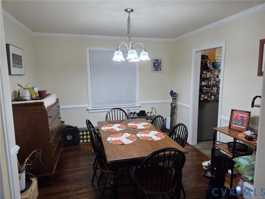 5813 Fitzhugh Avenue Richmond, VA 23226 - Photo 6 of 20 a view of a dining room with furniture and wooden floor