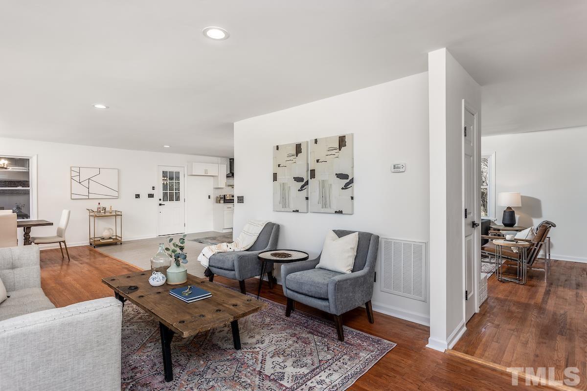313 Lord Ashley Road Raleigh, NC 27610 - Photo 12 of 32 a living room with furniture and wooden floor