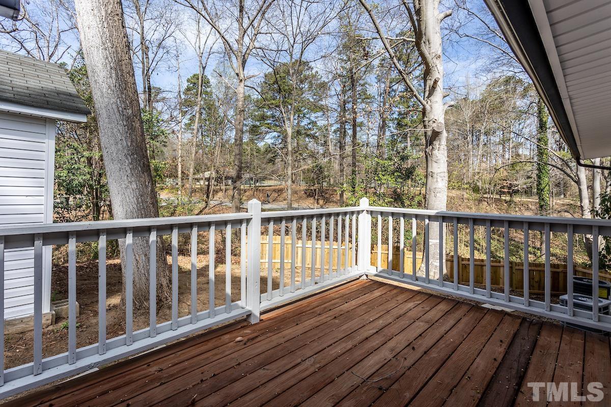 313 Lord Ashley Road Raleigh, NC 27610 - Photo 31 of 32 a view of balcony with wooden floor