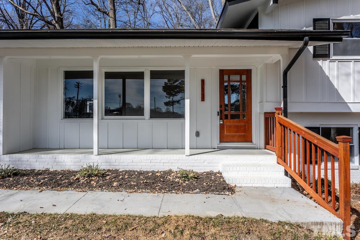 313 Lord Ashley Road Raleigh, NC 27610 - Photo 4 of 32 a view of a entrance of the house