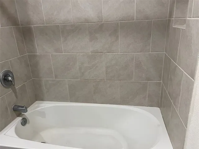 a bathroom with a bathtub
