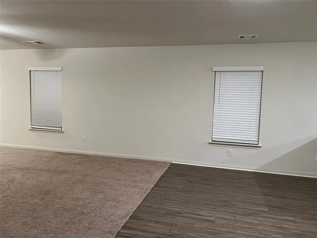 a stove top oven sitting inside of a kitchen