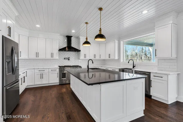 a close view of a sink and a mirror in a bathroom