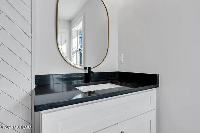 a view of a room with wooden floor and stairs