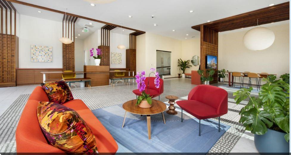 1099 Boulevard Southeast, Unit 1215 Atlanta, GA 30312 - Photo 10 of 19 a living room with furniture and a potted plant