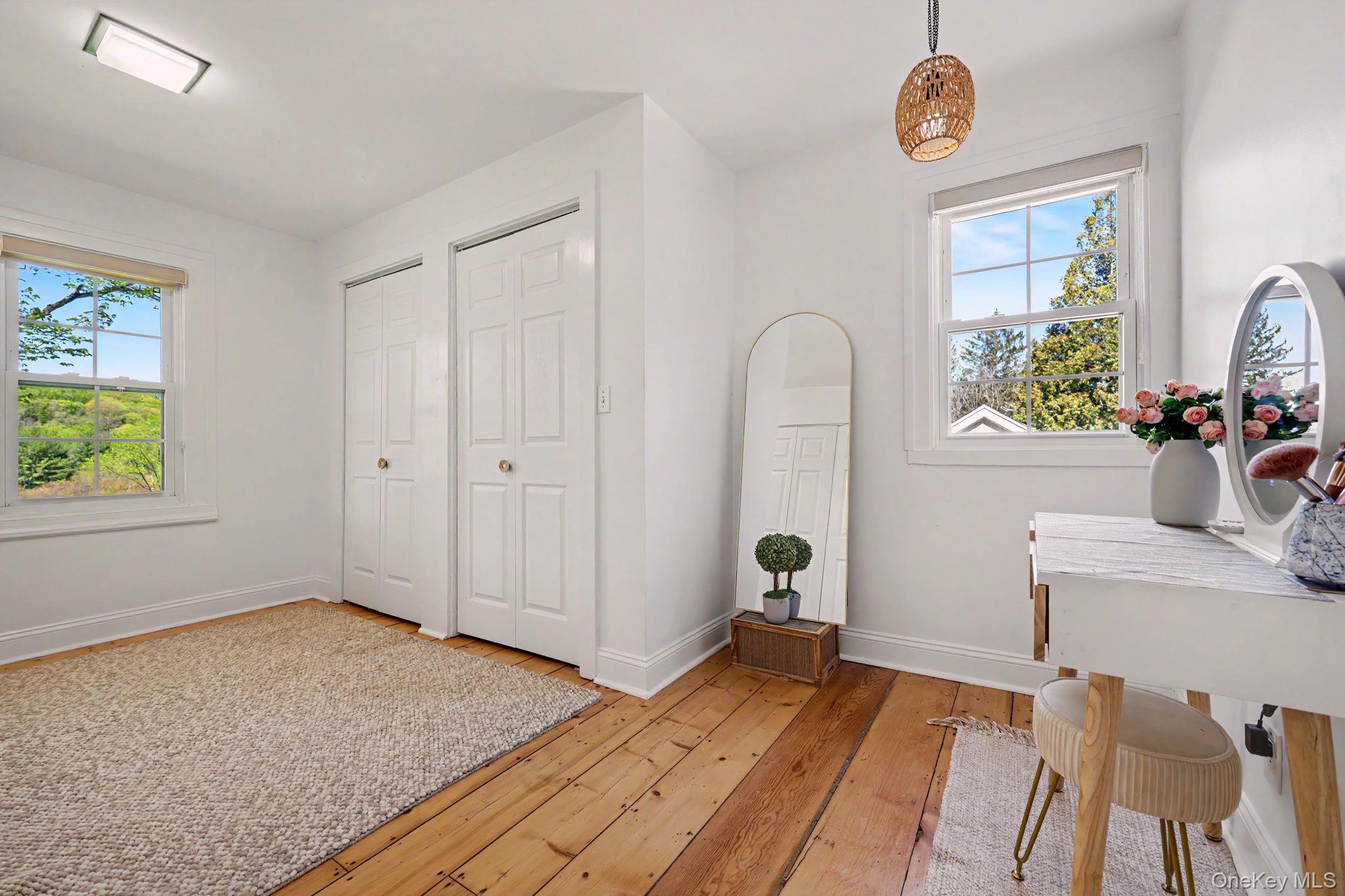 233 Long Ridge Road Bedford, NY 10506 - Photo 16 of 50 a view of empty room with window and wooden floor