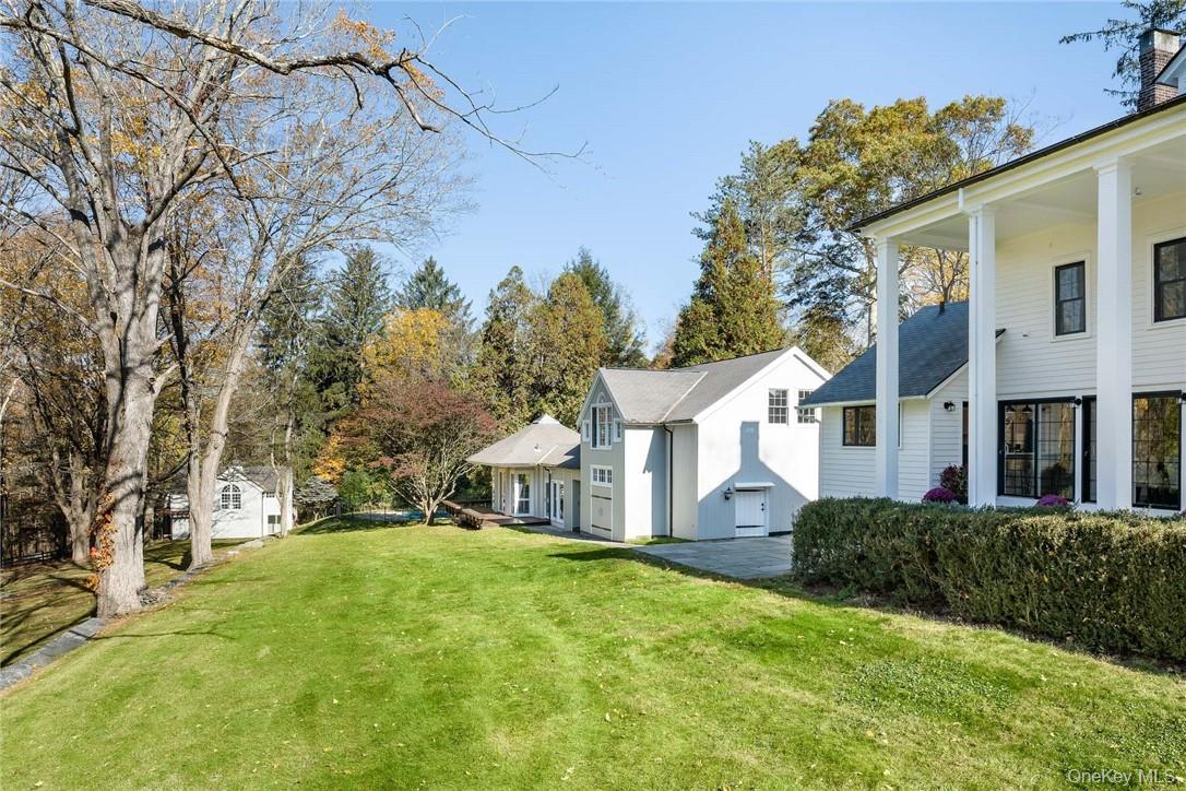233 Long Ridge Road Bedford, NY 10506 - Photo 24 of 50 a front view of a house with a yard