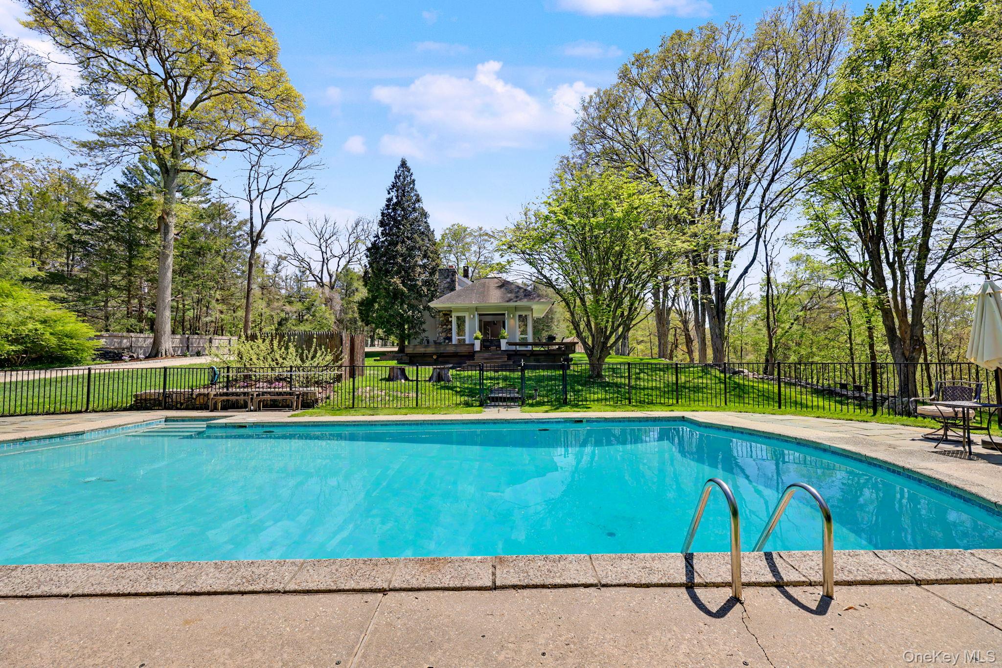 233 Long Ridge Road Bedford, NY 10506 - Photo 35 of 50 a view of a swimming pool with a yard