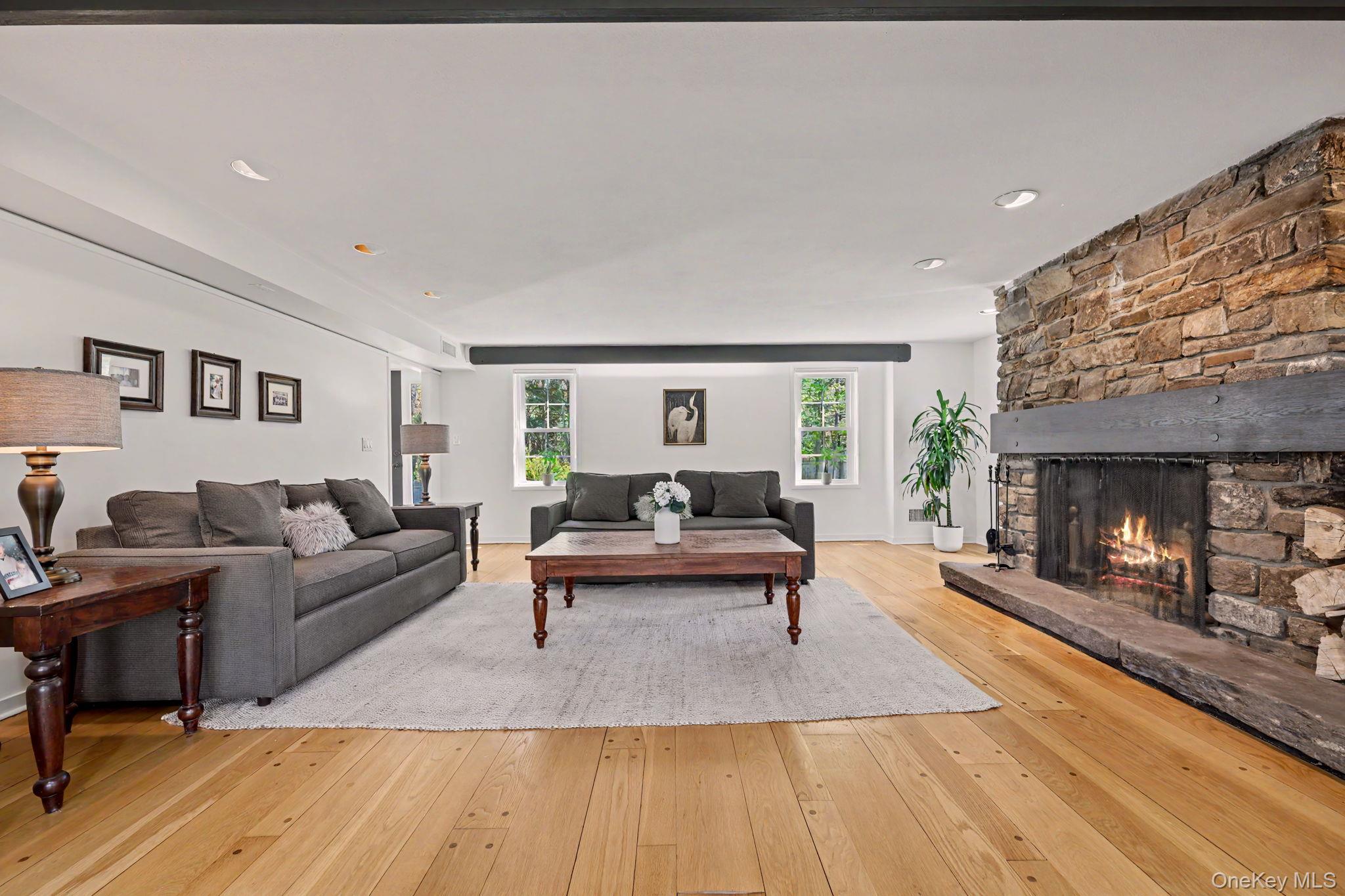 233 Long Ridge Road Bedford, NY 10506 - Photo 10 of 50 a living room with furniture and a fireplace