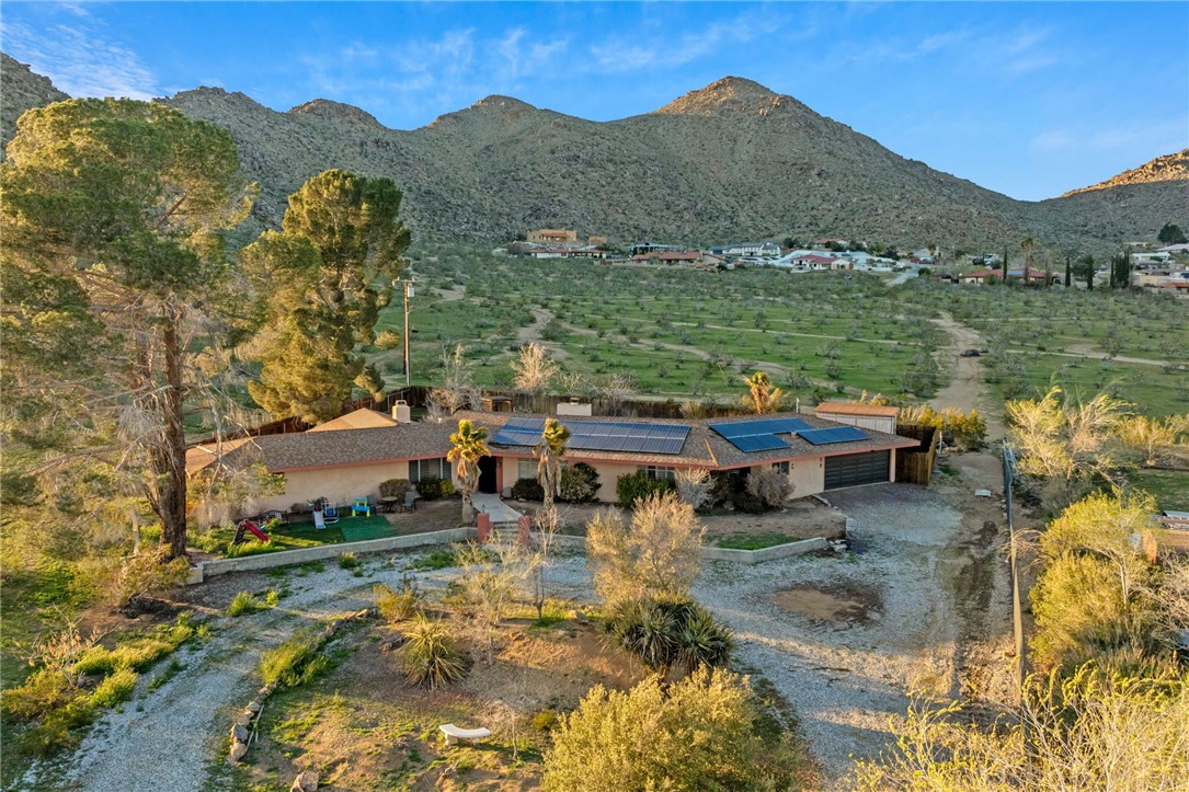 19864 Rimrock Road East Apple Valley, CA 92307 - Photo 1 of 1 a view of a lake with a mountain