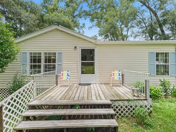 a view of a house with a patio