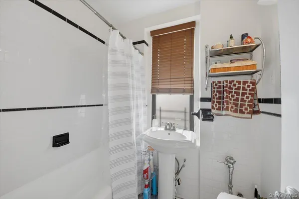 a bathroom with a toilet and a sink