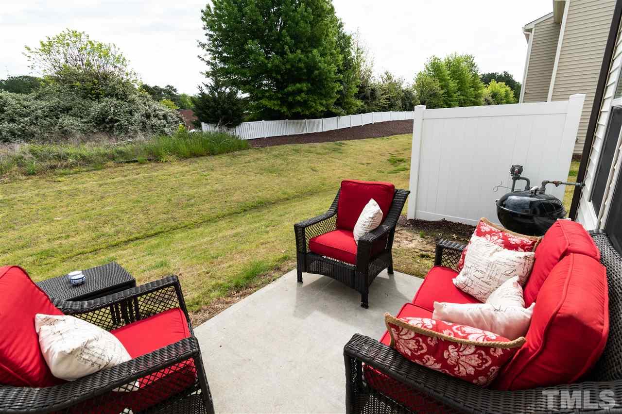 302 Leighann Ridge Lane Rolesville, NC 27571 - Photo 20 of 21 a balcony with chairs and a table