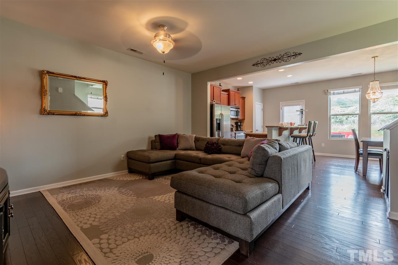 302 Leighann Ridge Lane Rolesville, NC 27571 - Photo 4 of 21 a living room with furniture and a wooden floor