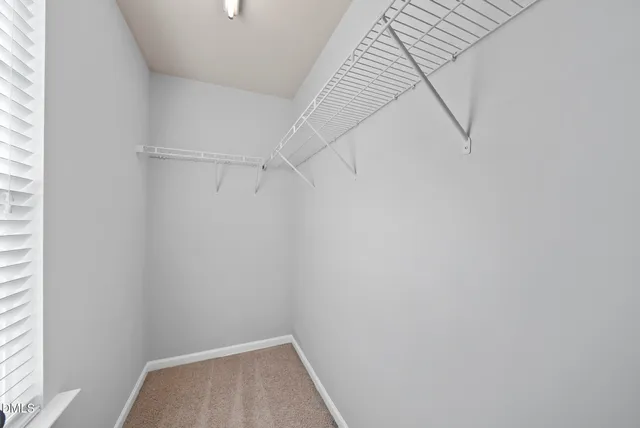 a view of a room with racks on the wall