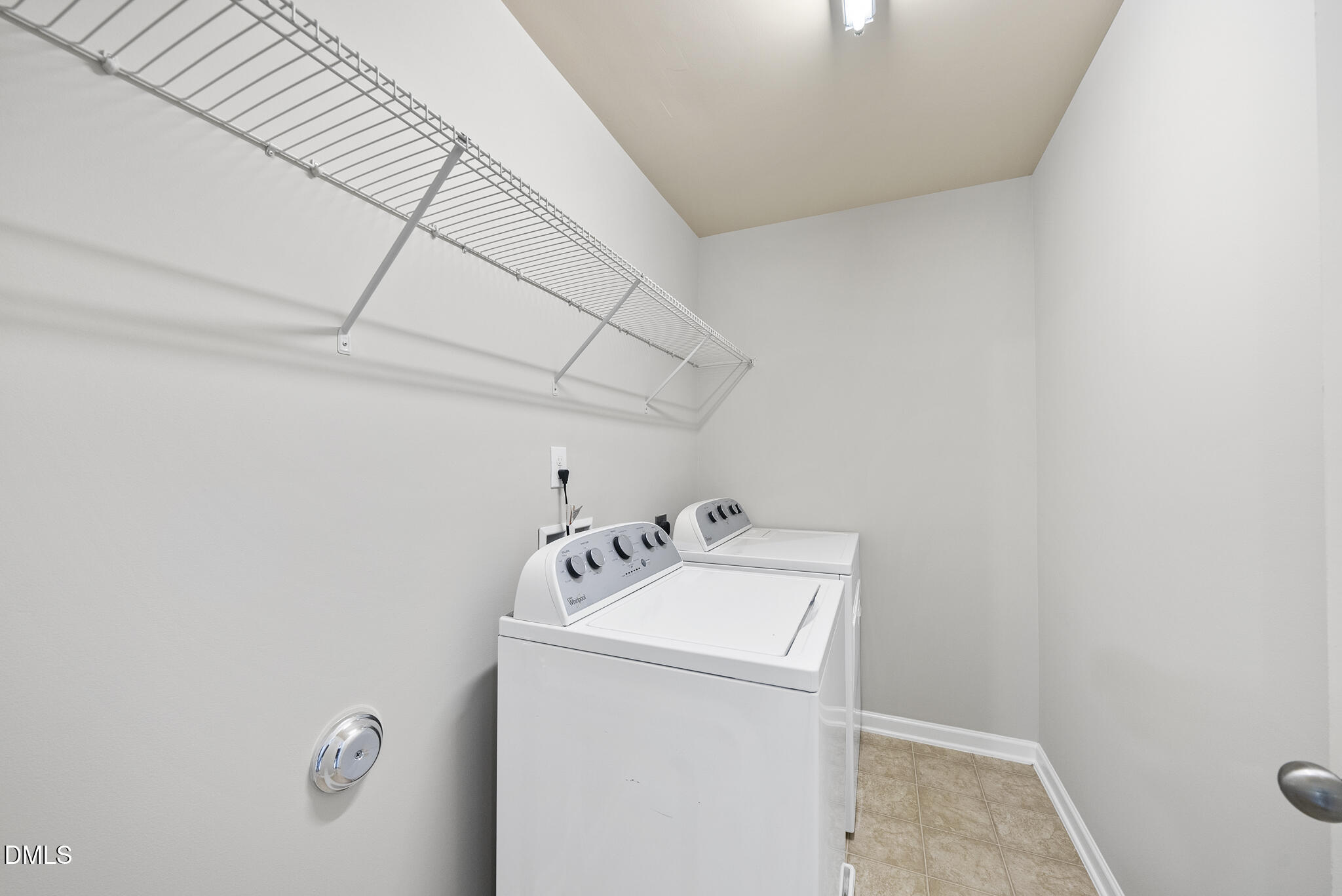 404 Provincial Street Raleigh, NC 27603 - Photo 17 of 24 a utility room with dryer and washer