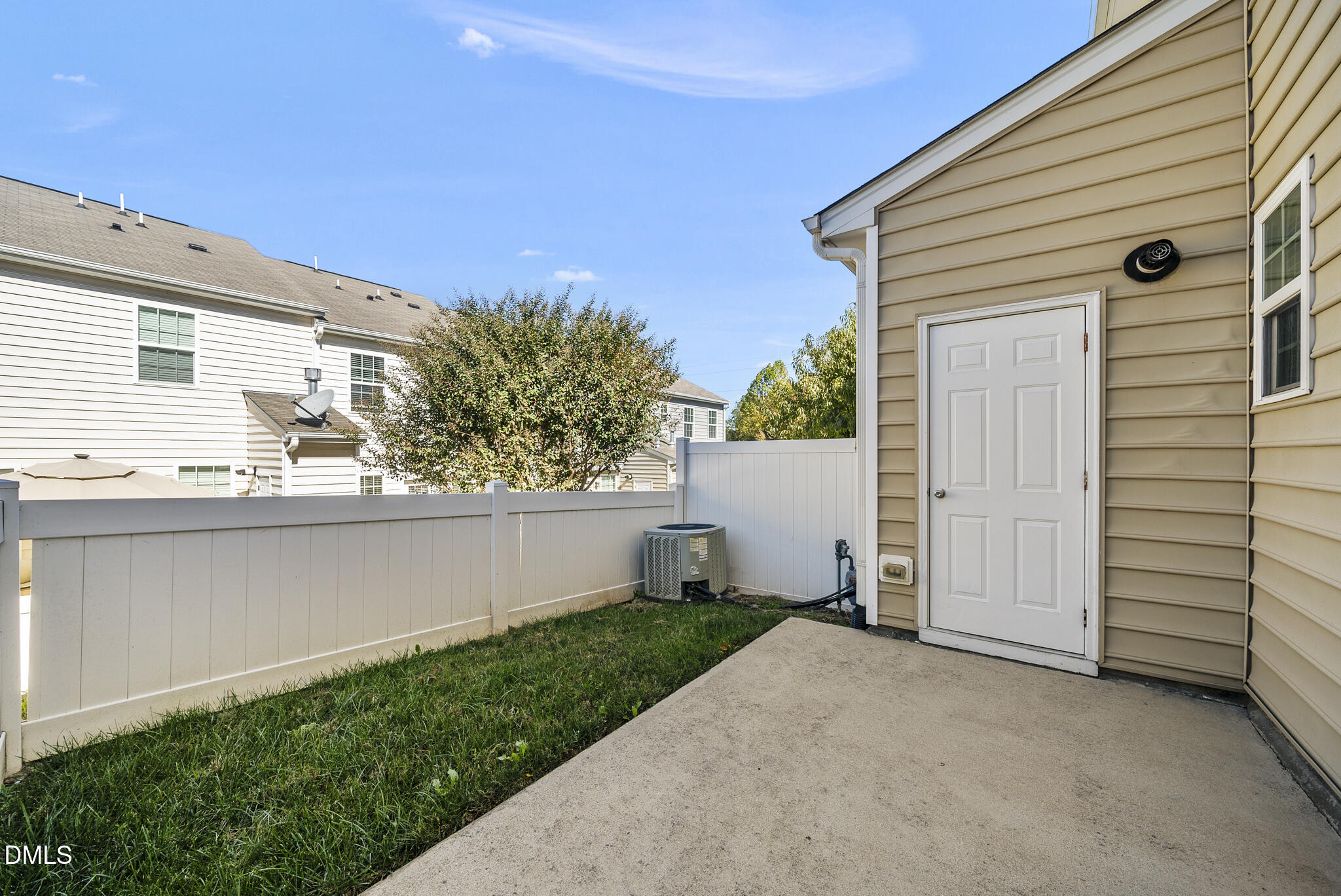 404 Provincial Street Raleigh, NC 27603 - Photo 18 of 24 a view of a house with a yard