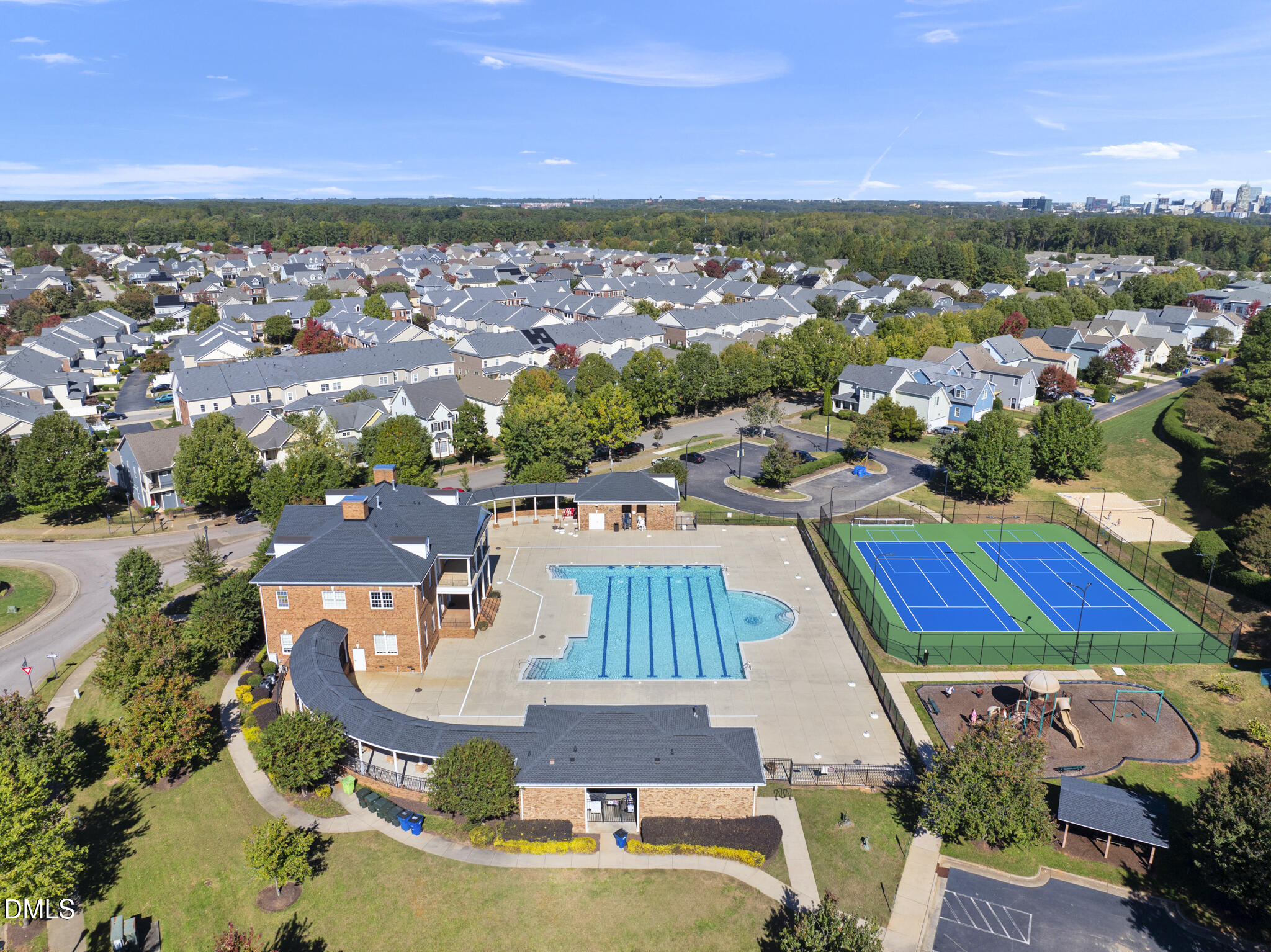 404 Provincial Street Raleigh, NC 27603 - Photo 21 of 24 an aerial view of residential houses with outdoor space and ocean view