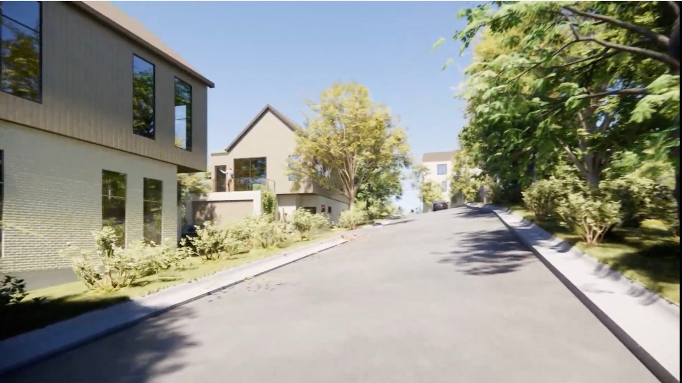 1106 Lott Avenue Austin, TX 78721 - Photo 4 of 13 a road view with tall buildings