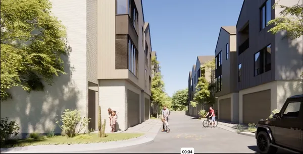 an aerial view of houses with yard