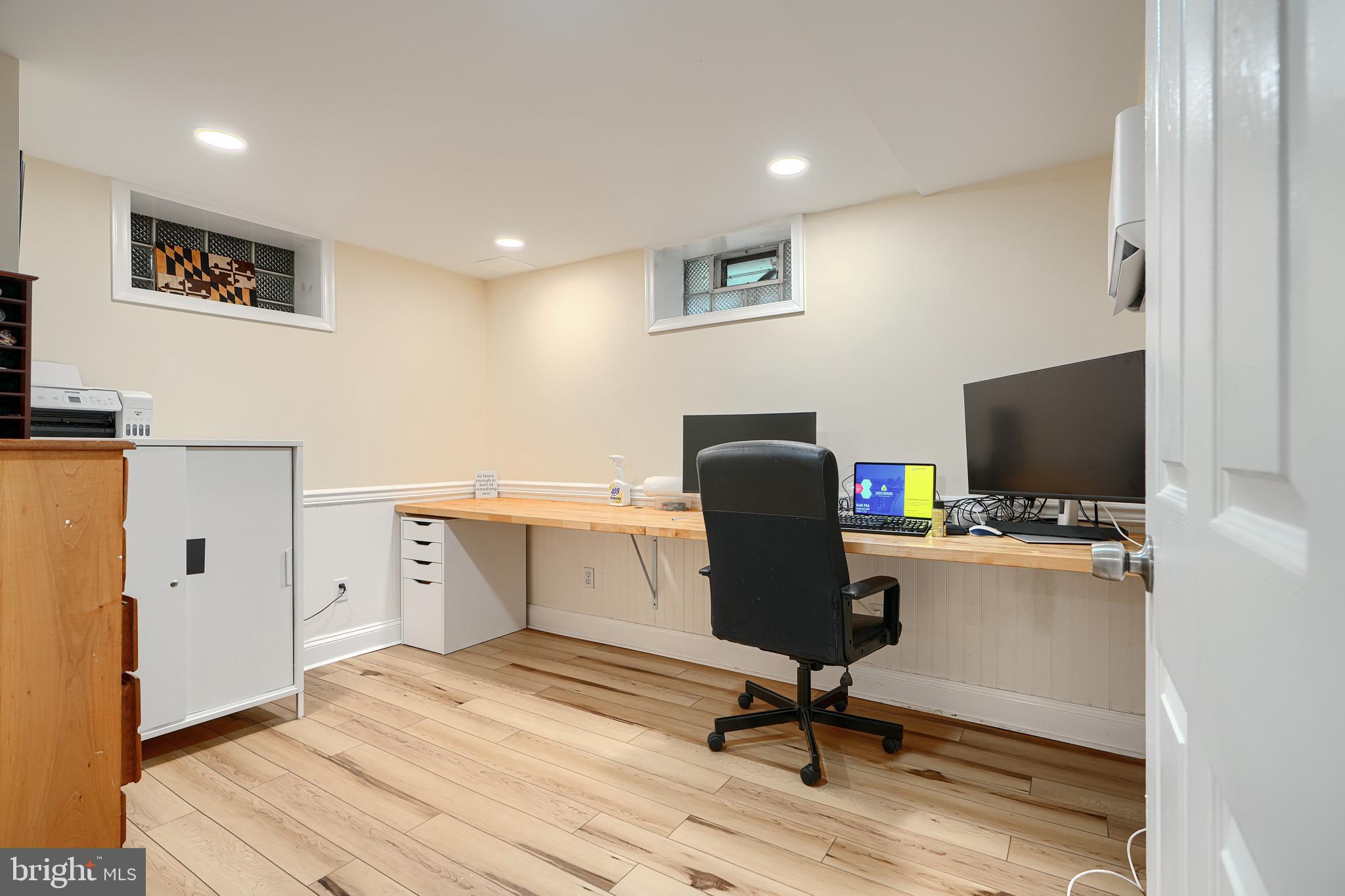 231 Gralan Road Catonsville, MD 21228 - Photo 18 of 37 a view of a workspace with furniture and a window