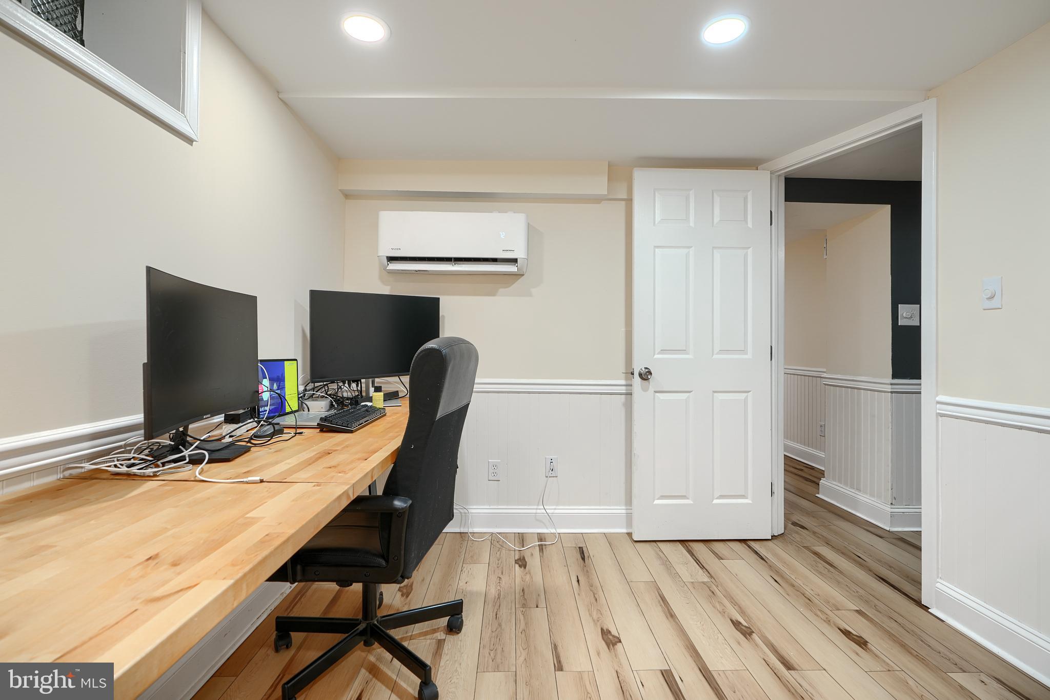 231 Gralan Road Catonsville, MD 21228 - Photo 19 of 37 a view of a workspace with furniture and wooden floor