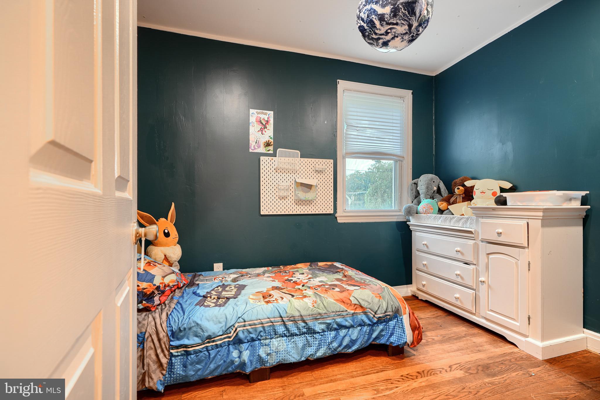 231 Gralan Road Catonsville, MD 21228 - Photo 27 of 37 a bedroom with a bed and a window